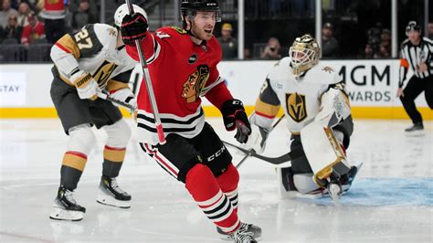 Blackhawks hand Vegas first loss of season with 4-3 win in overtime
